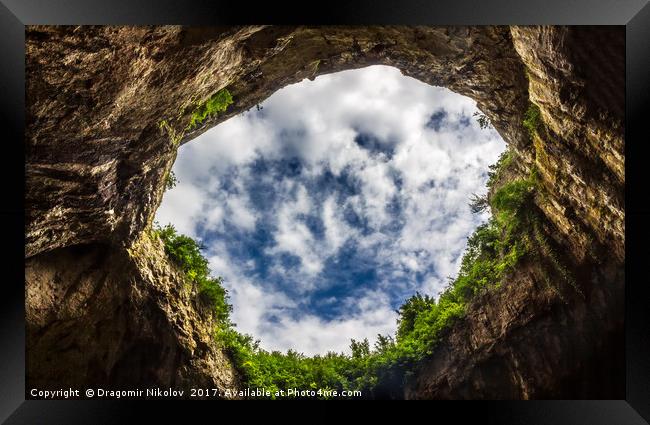 Sky through under the cave Framed Print by Dragomir Nikolov
