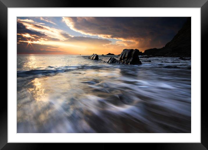 The day concludes at Duckpool Bay Framed Mounted Print by mark leader