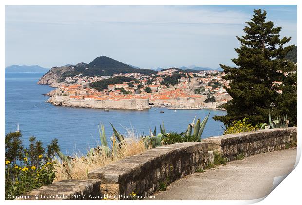 Dubrovnik's old town seen over a curving coastal r Print by Jason Wells