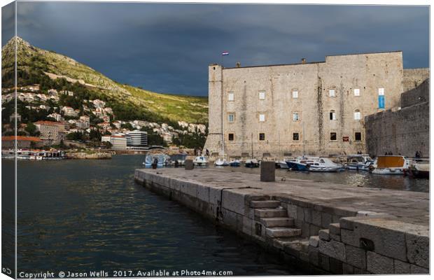 Stormy skies behind St John’s Fortress Canvas Print by Jason Wells
