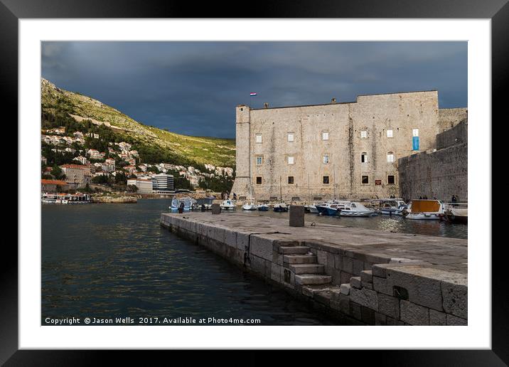 Stormy skies behind St John’s Fortress Framed Mounted Print by Jason Wells