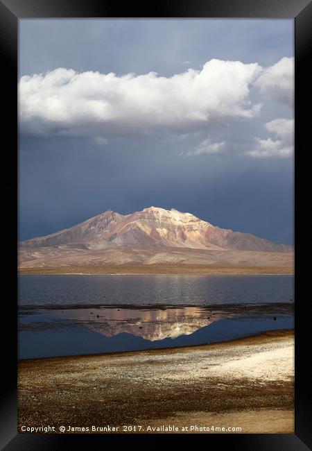 Stormy Skies Over Lake Chungara Chile Vertical Framed Print by James Brunker