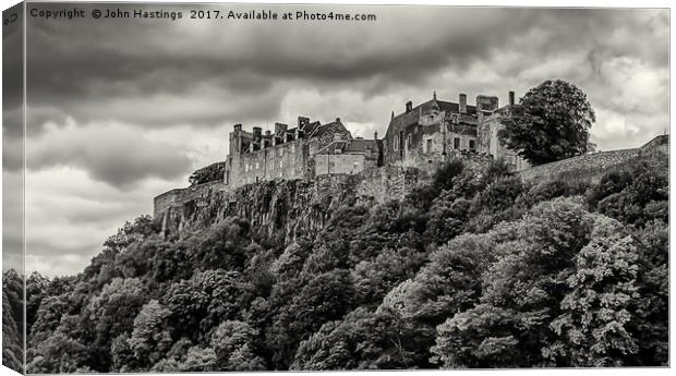 Storm over Stirling Castle Canvas Print by John Hastings