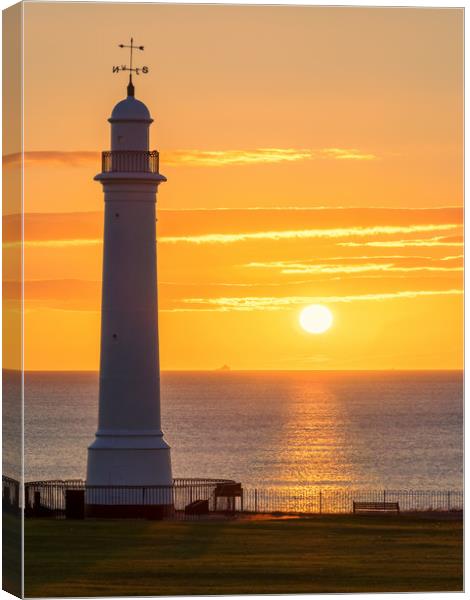 Sunrise at Seaburn Beach with White Lighthouse Canvas Print by Ian Aiken