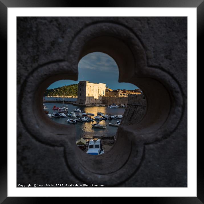 St John’s Fortress lit up at sunset Framed Mounted Print by Jason Wells