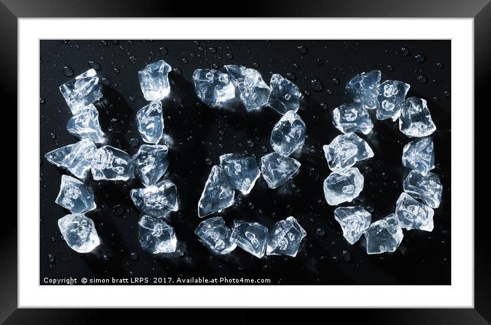 H2O water symbol written in ice cubes and melting Framed Mounted Print by Simon Bratt LRPS