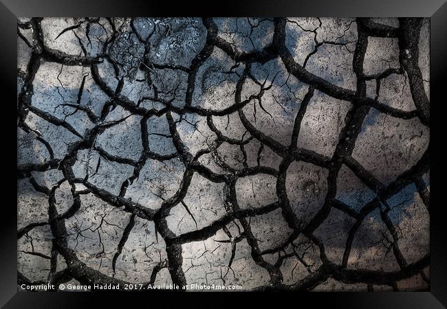 Crack in the sand. Framed Print by George Haddad