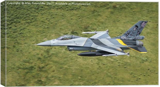 Majestic Belgian F16s Soar Above Mountain Range Canvas Print by Alan Tunnicliffe
