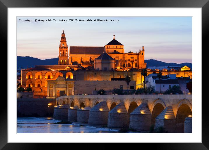 Cordoba Cathedral and Roman Bridge at dusk Framed Mounted Print by Angus McComiskey