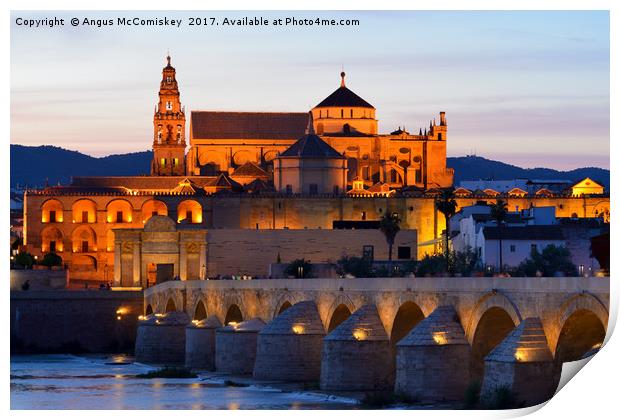 Cordoba Cathedral and Roman Bridge at dusk Print by Angus McComiskey