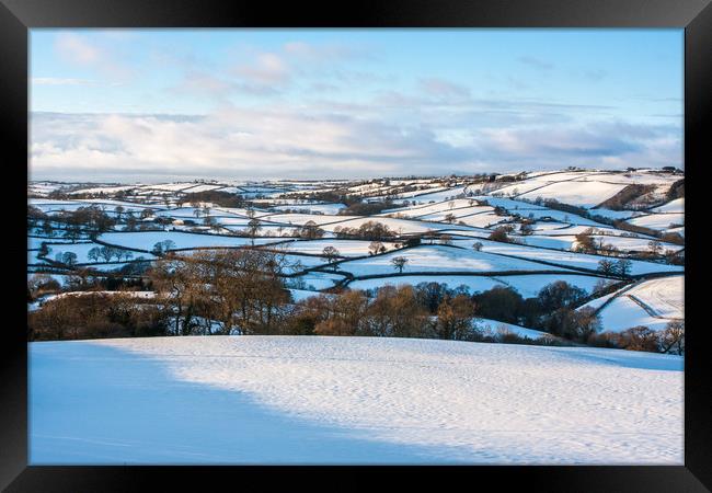 Devon's Snowy Patchwork Framed Print by Dave Rowlatt