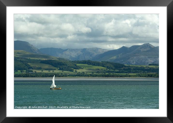 Snowdonia from the Menai Straits on a cloudy day Framed Mounted Print by John Mitchell