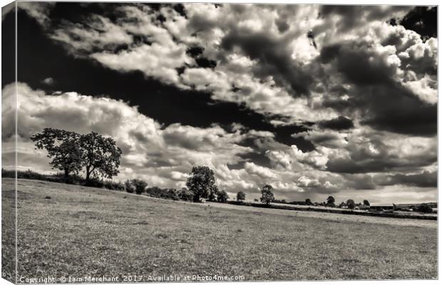 Storm Clouds over Marefield Canvas Print by Iain Merchant