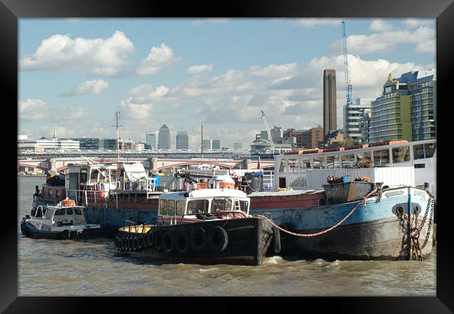 Thames barges and Canary Wharf Framed Print by Chris Day