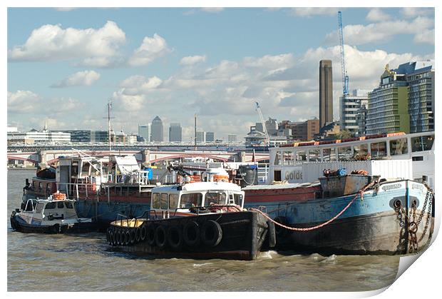Thames barges and Canary Wharf Print by Chris Day
