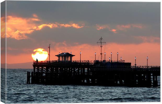 End of the pier fisherman Canvas Print by Tony Bates