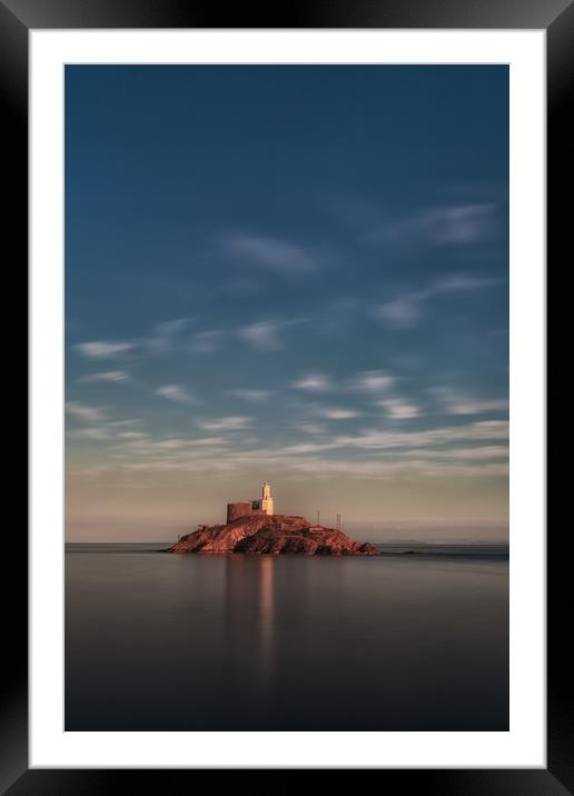 Calm sea at Mumbles lighthouse Framed Mounted Print by Leighton Collins