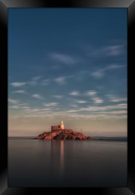Calm sea at Mumbles lighthouse Framed Print by Leighton Collins