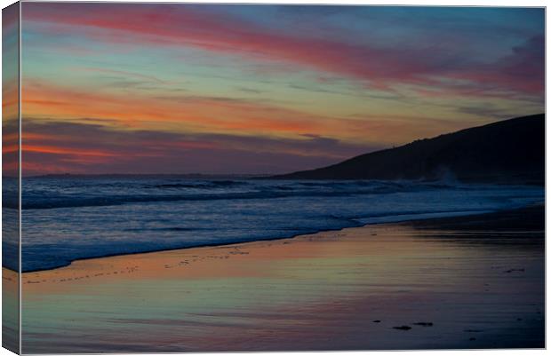 Rest Bay Sunset Canvas Print by Emma Woodhouse
