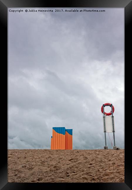Clouds Over The Beach Framed Print by Jukka Heinovirta