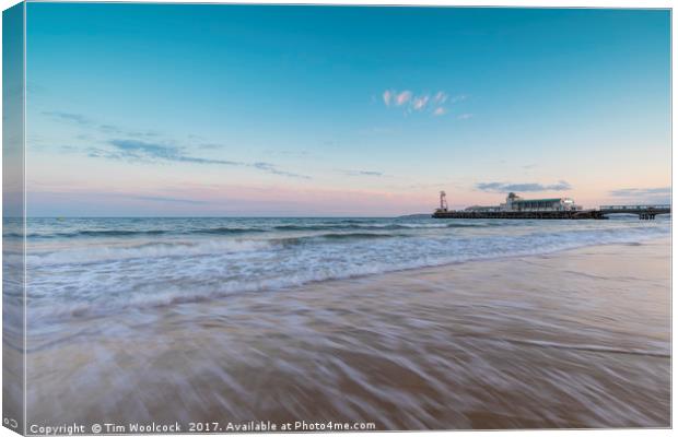 Bournemouth Pier at sunset Canvas Print by Tim Woolcock