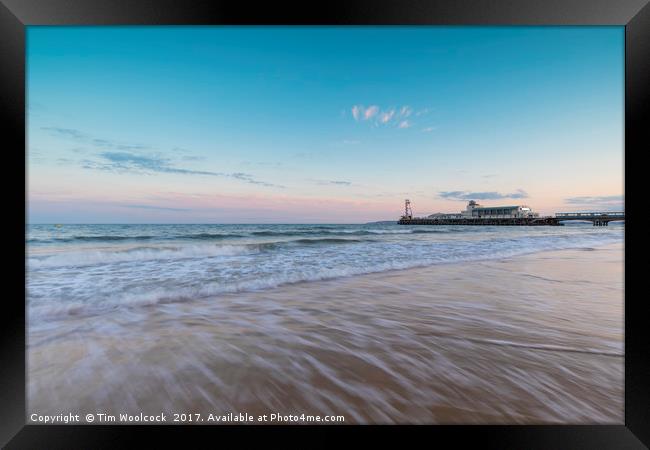 Bournemouth Pier at sunset Framed Print by Tim Woolcock
