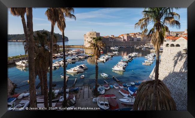 Boats lined up in Dubrovnik harbour Framed Print by Jason Wells