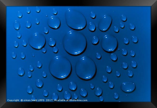 Water drops pattern on blue background Framed Print by Simon Bratt LRPS
