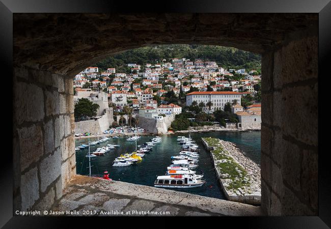 Boats in Dubrovnik's old harbour Framed Print by Jason Wells