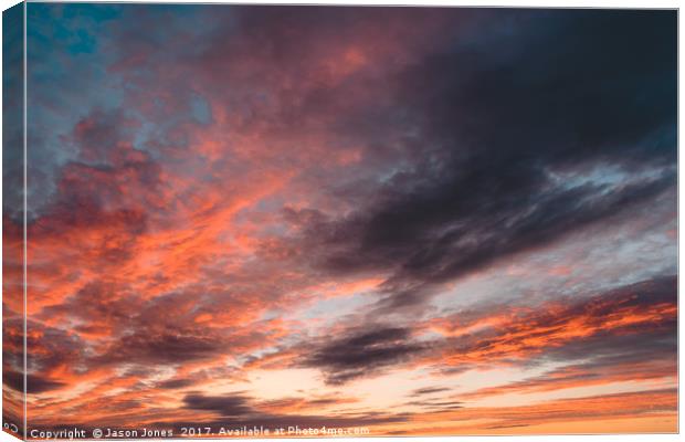 Colourful Sunset Clouds - Anglesey, North Wales Canvas Print by Jason Jones