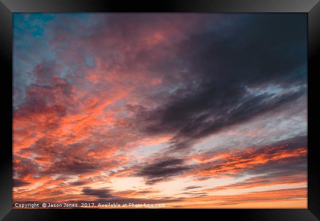 Colourful Sunset Clouds - Anglesey, North Wales Framed Print by Jason Jones