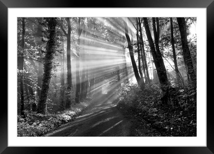 Crepuscular rays (black and white).  Framed Mounted Print by John Finney