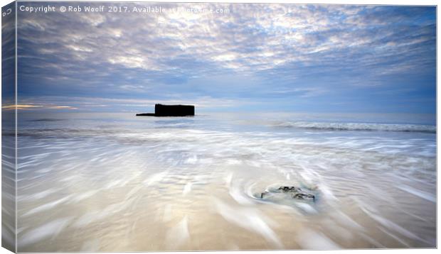 Transfixed by the Sea Canvas Print by Rob Woolf