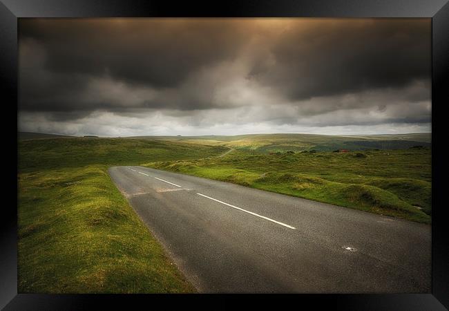 Dartmoors Winding road Framed Print by Dean Messenger