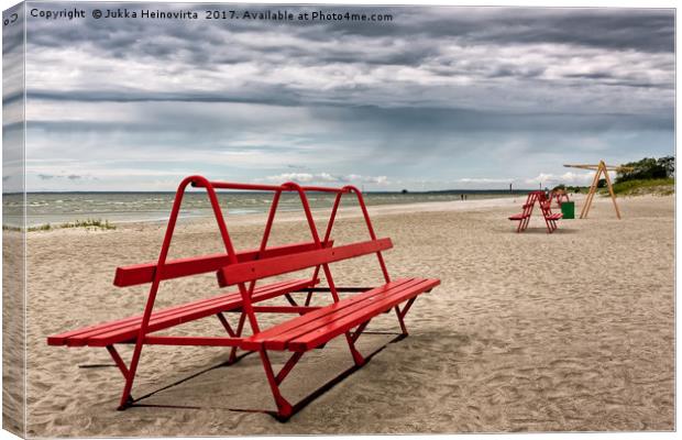 Red Bench On A Beach Canvas Print by Jukka Heinovirta