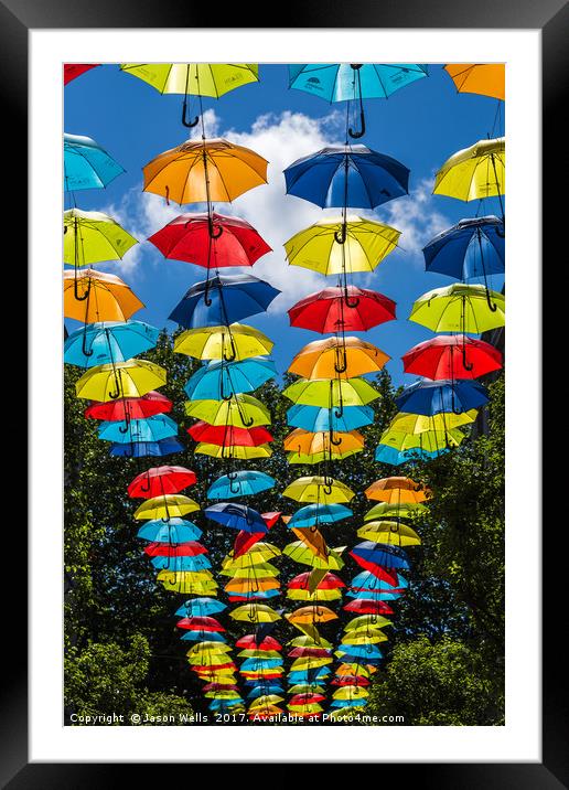Rainbow of umbrellas hanging in Liverpool fade int Framed Mounted Print by Jason Wells