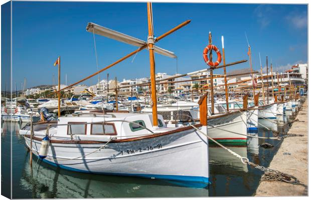 Small boats in Port de Pollensa  Canvas Print by Perry Johnson