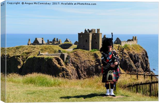 Piper at Dunnottar Castle Canvas Print by Angus McComiskey