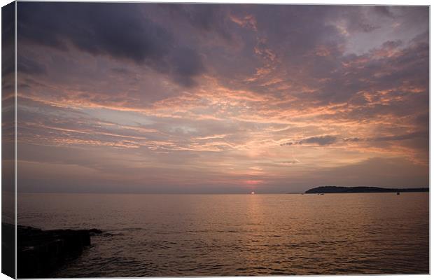 Sundown over the Adriatic coastline Canvas Print by Ian Middleton