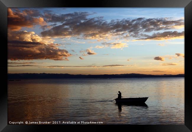 Fishing on Lake Titicaca at Sunset  Framed Print by James Brunker
