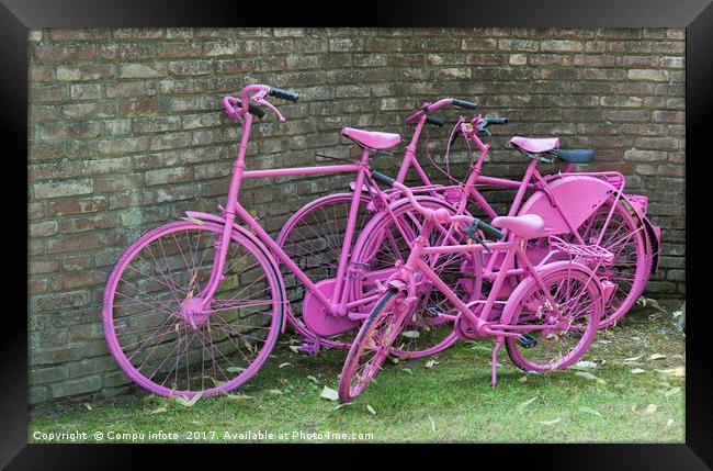 pink painted bikes and old wall Framed Print by Chris Willemsen