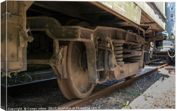 old rosted dirty wheels from train on railroad Canvas Print by Chris Willemsen