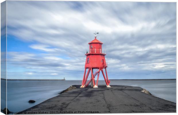 Majestic Clouds Hovering over the Groyne Canvas Print by andrew blakey