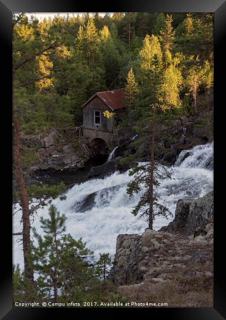 houses at waterfall in norway Framed Print by Chris Willemsen