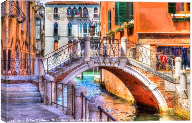 Small Venetian Bridge Canvas Print by Ian Danbury