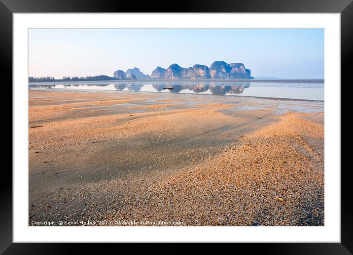 Reflections of limestone cliffs Framed Mounted Print by Kevin Hellon