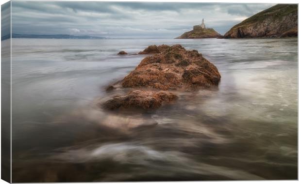 Outgoing tide at Mumbles lighthouse Canvas Print by Leighton Collins