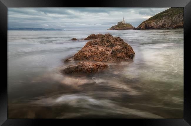 Outgoing tide at Mumbles lighthouse Framed Print by Leighton Collins