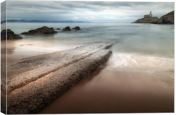 Mumbles Beach and Lighthouse Canvas Print by Leighton Collins