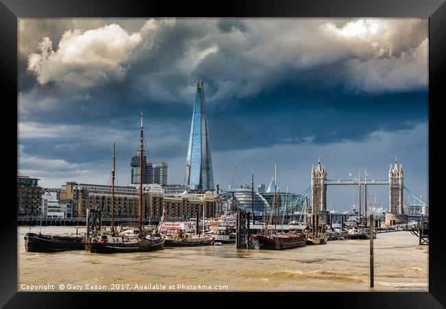 Storm looming over The Shard and Tower Bridge Framed Print by Gary Eason